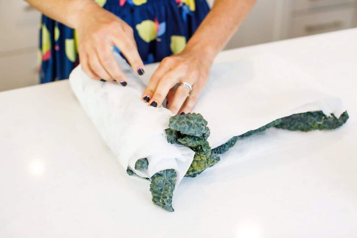 Rolling leafy greens in paper towel