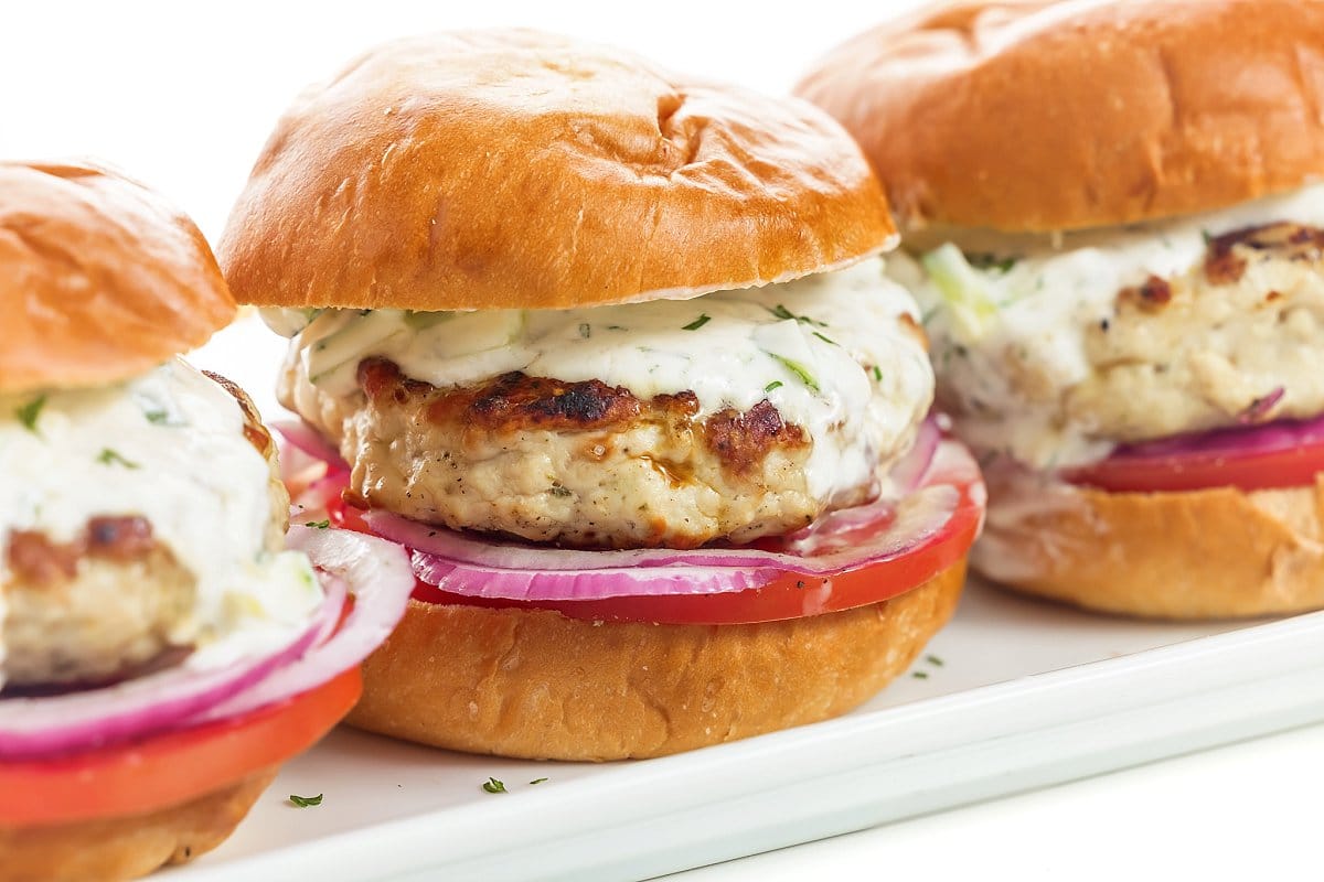 Homemade Turkey Burgers in a row, one of 25 healthy ground turkey recipes.