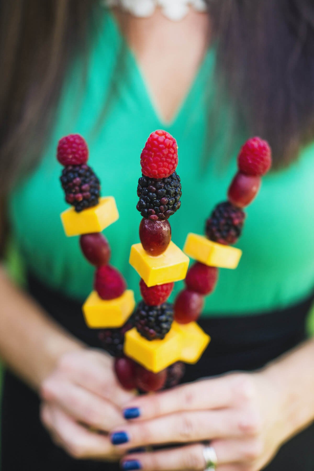 person holding Fruit and Cheese Kabobs