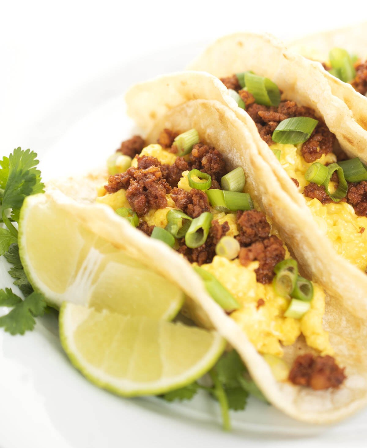 Breakfast Tacos with Chorizo and a wedge of lime