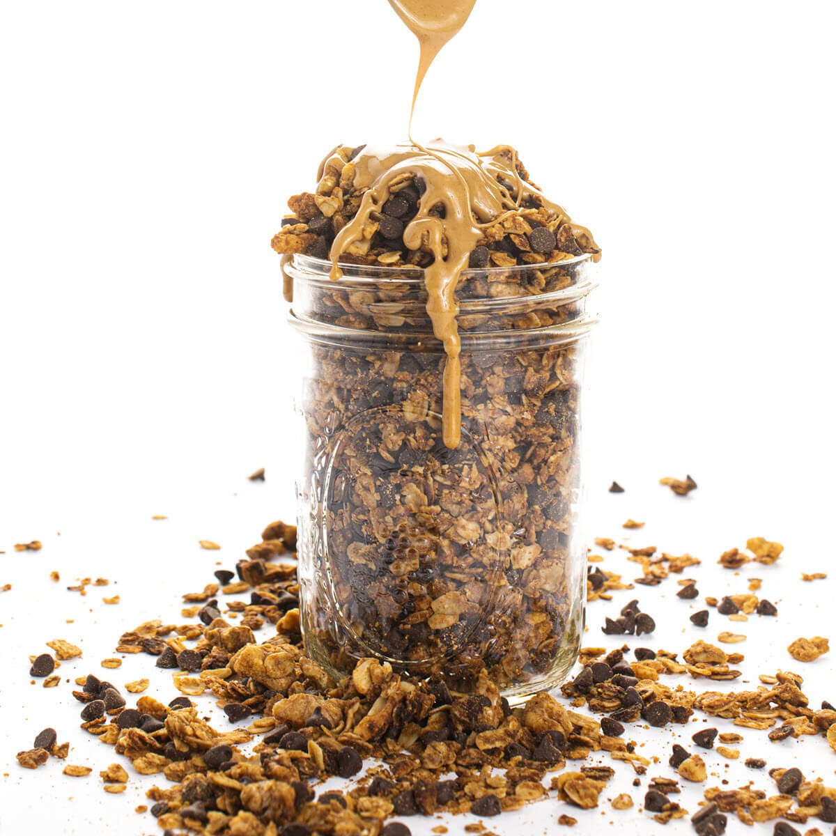 Chocolate Peanut Butter Granola with a peanut butter drizzle