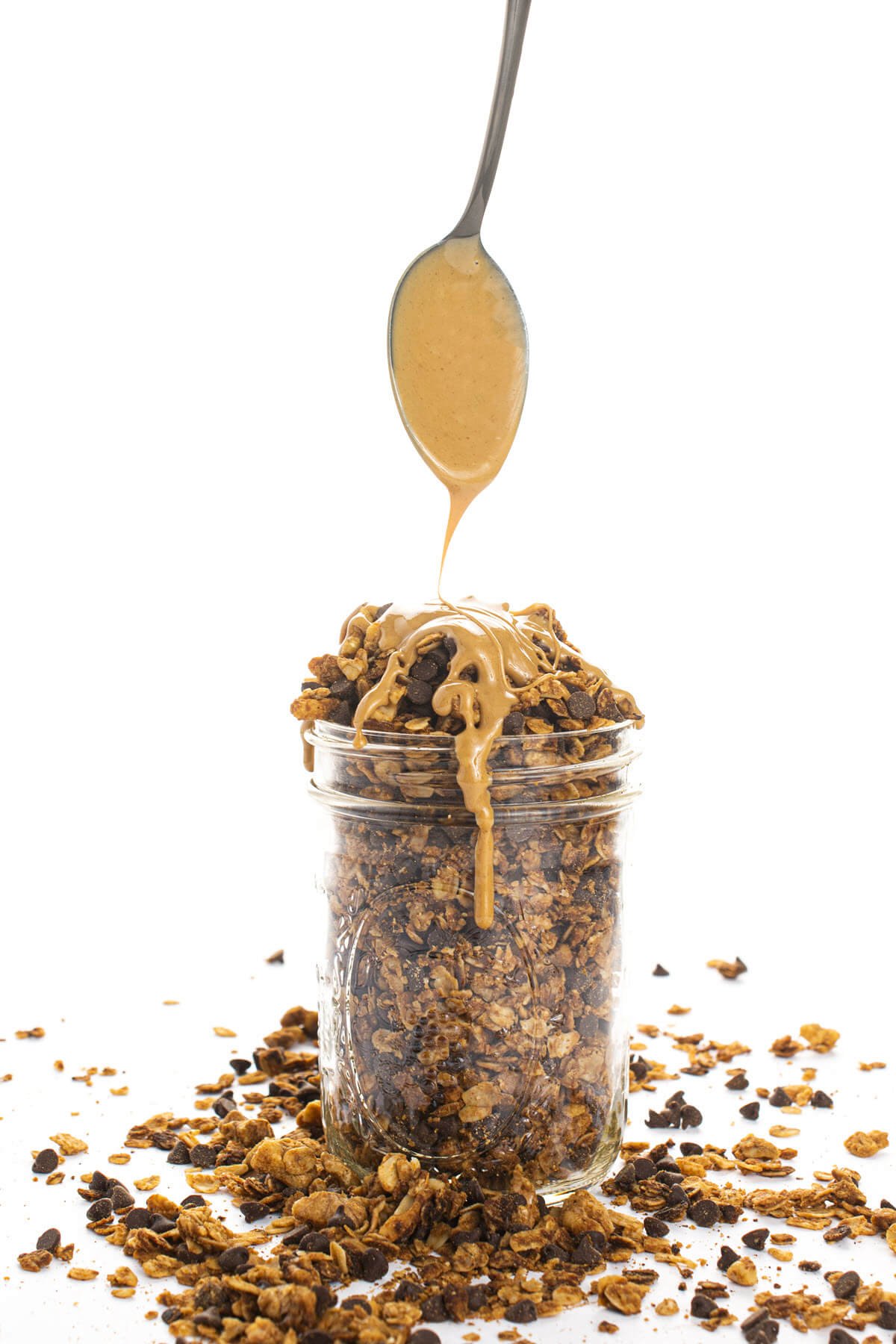 Chocolate Peanut Butter Granola with a peanut butter drizzle
