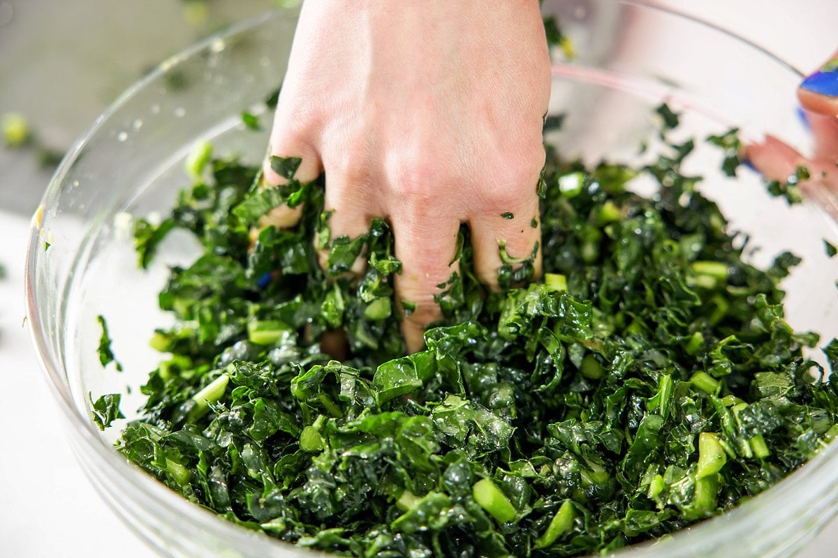 Mixing kale for salad