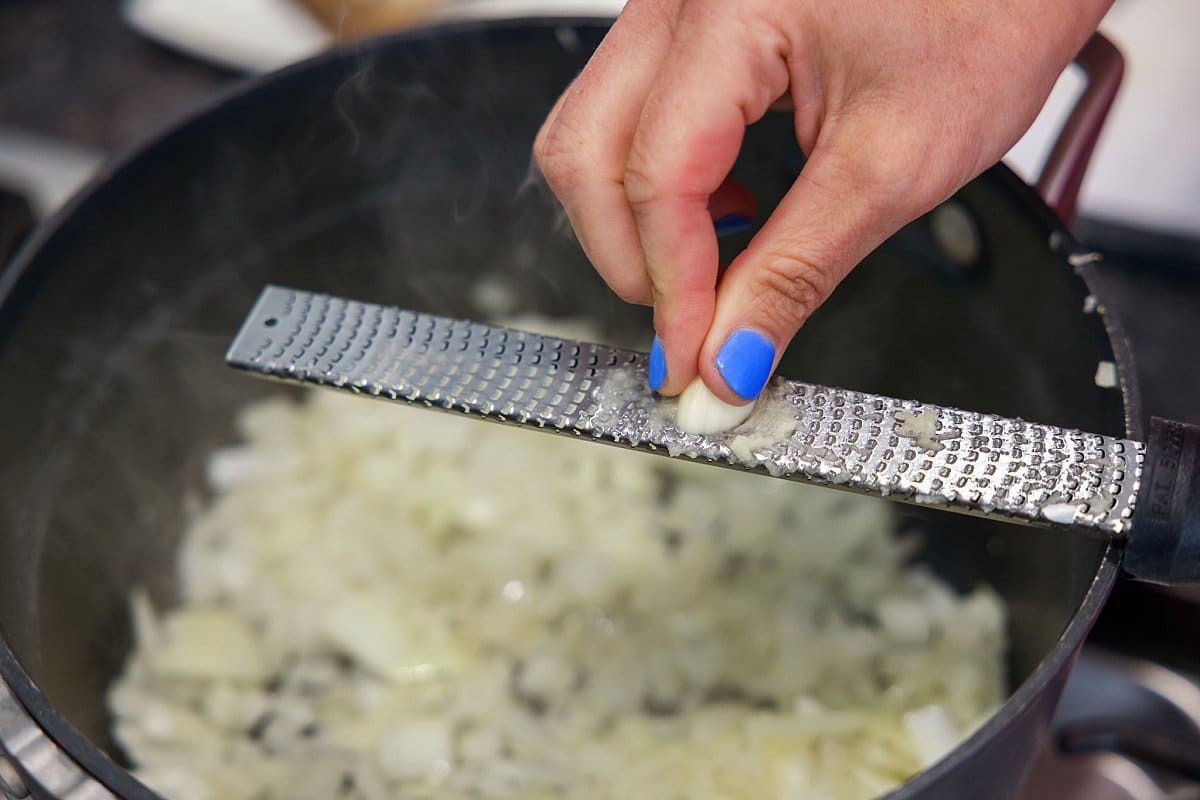 Liz grating garlic.