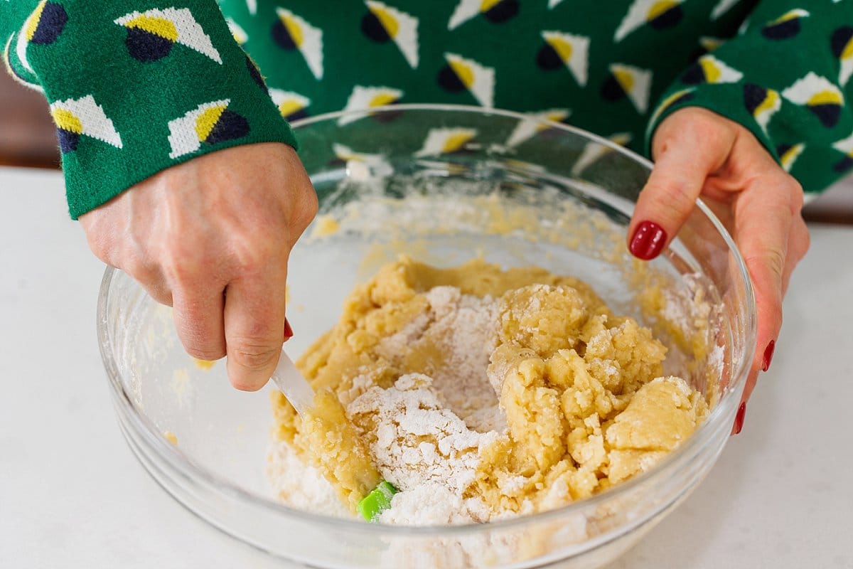A person mixing ingredients