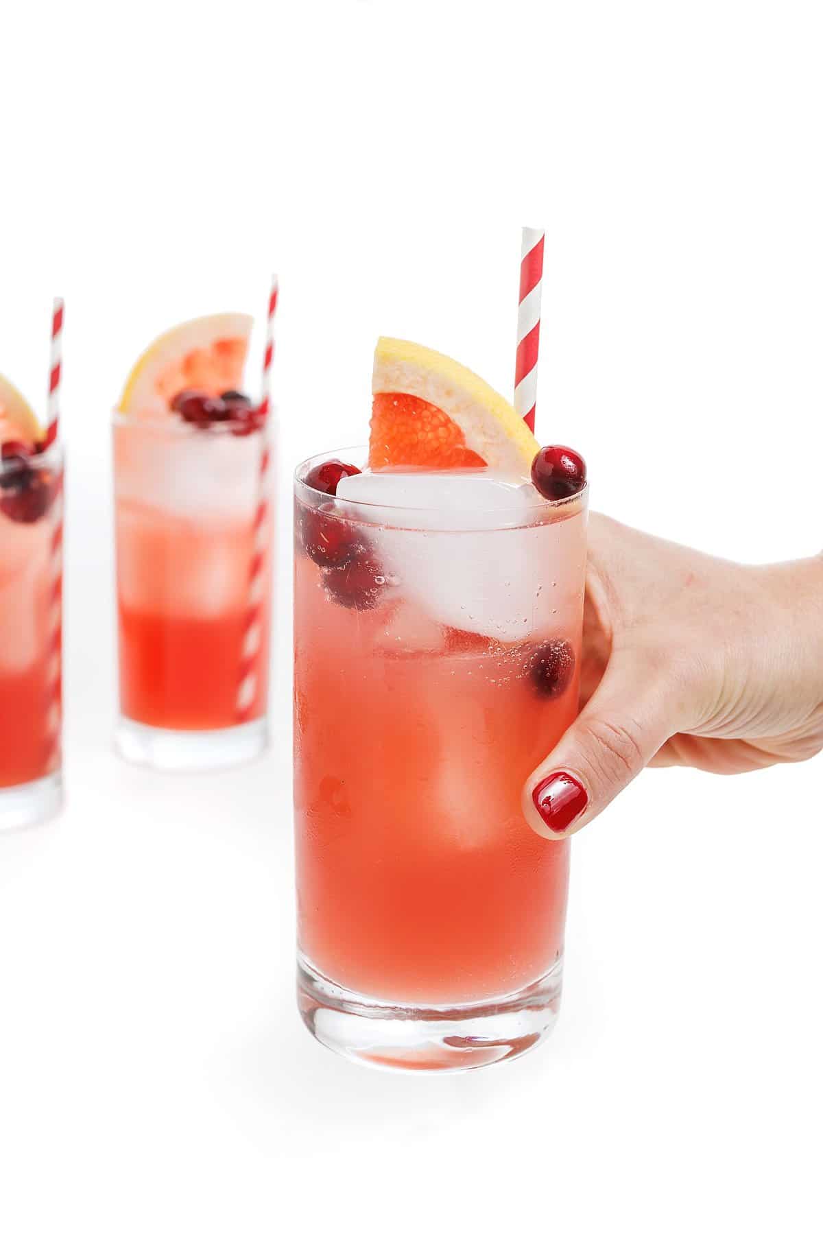 Hand holding Seabreeze cocktail.