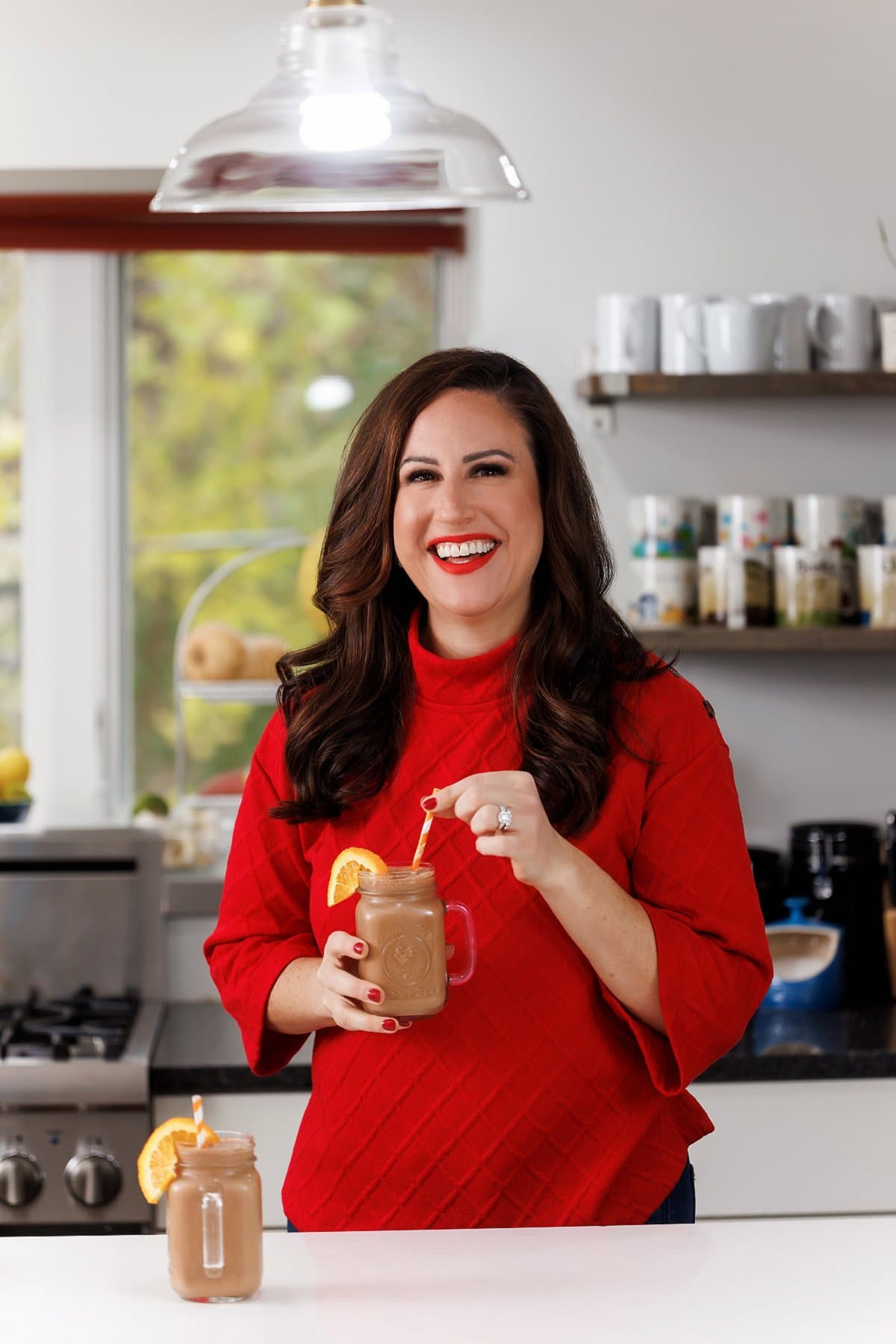 Liz drinking chocolate orange protein smoothie.