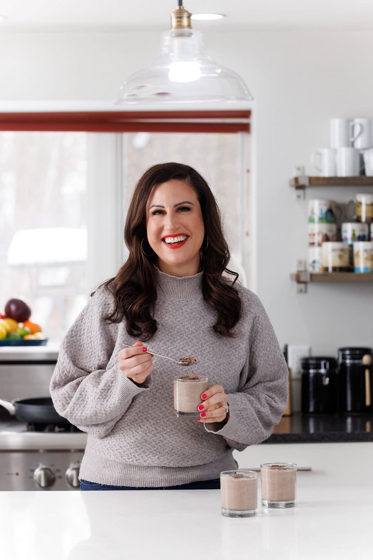 Liz eating Vegan chocolate espresso mousse.