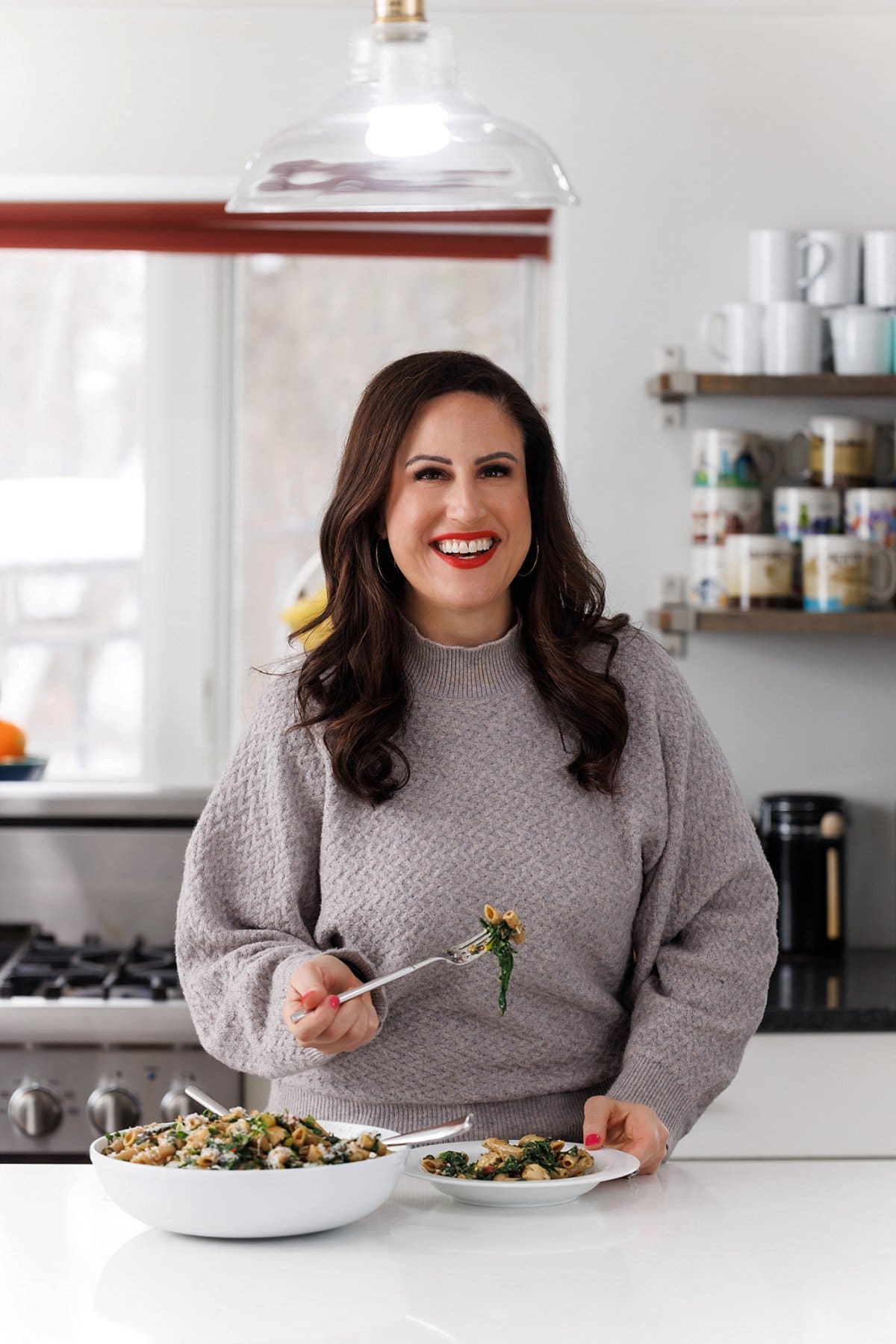 Liz eating italian chicken pasta