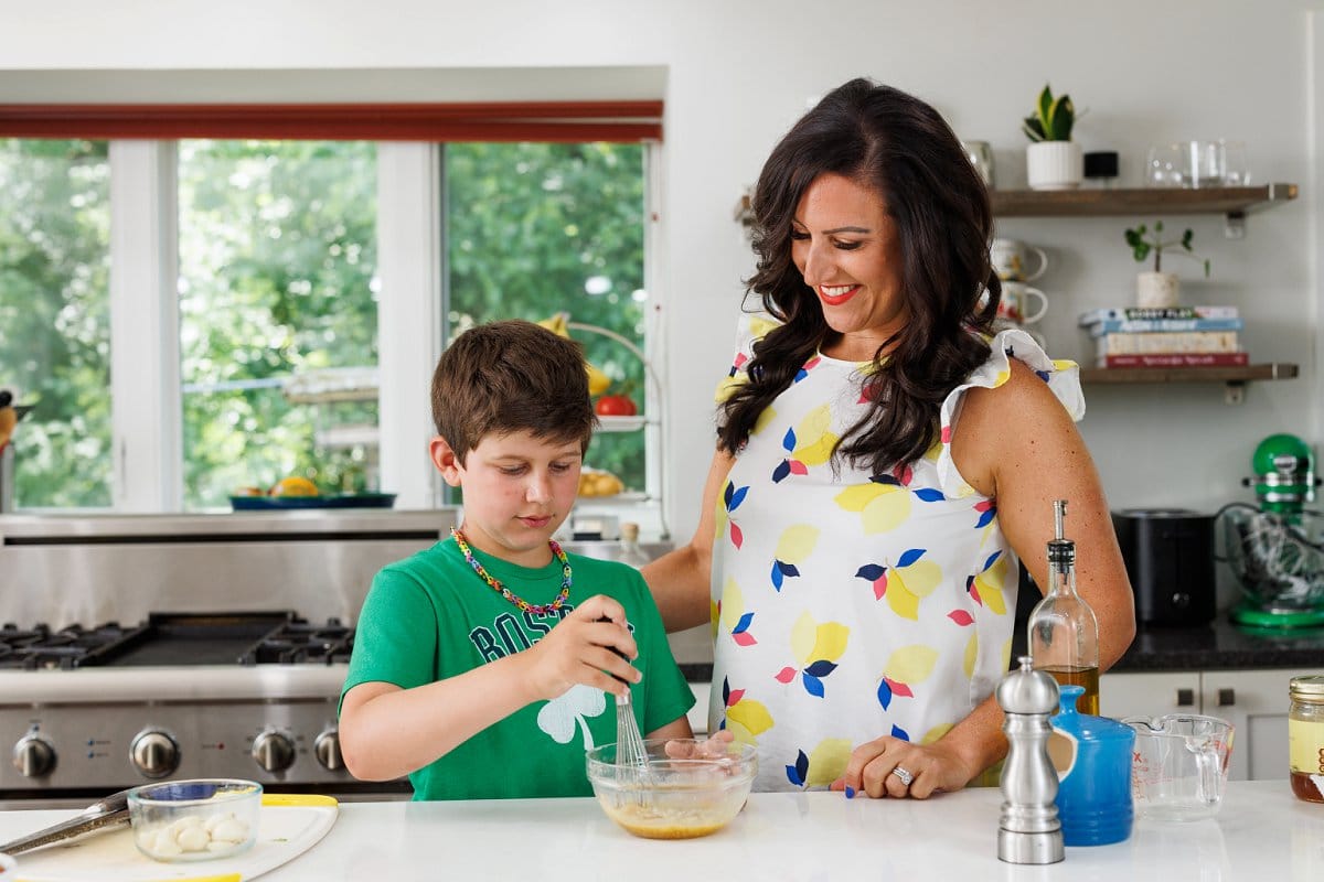 Liz and son making honey mustard vinaigrette.
