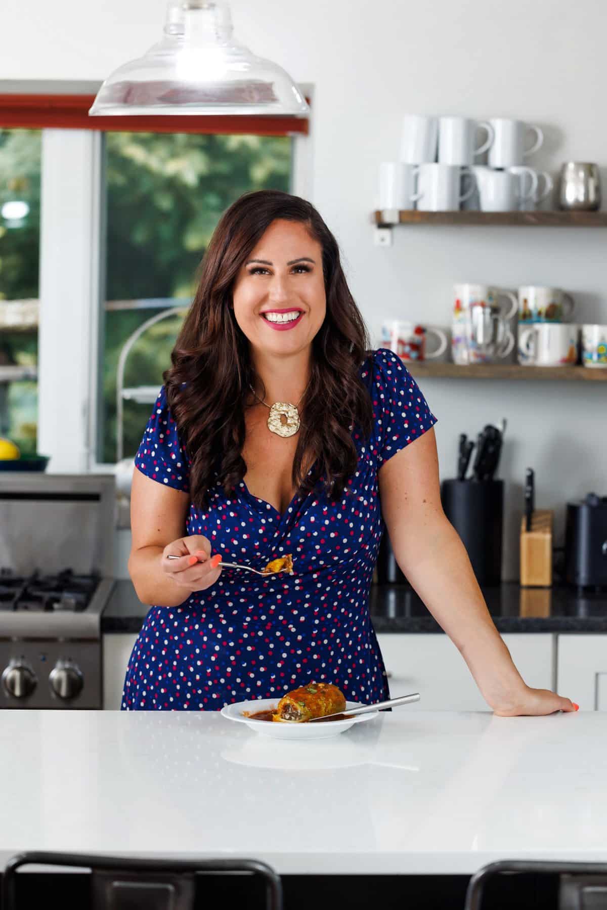 Liz eating Lebanese stuffed kousa squash.