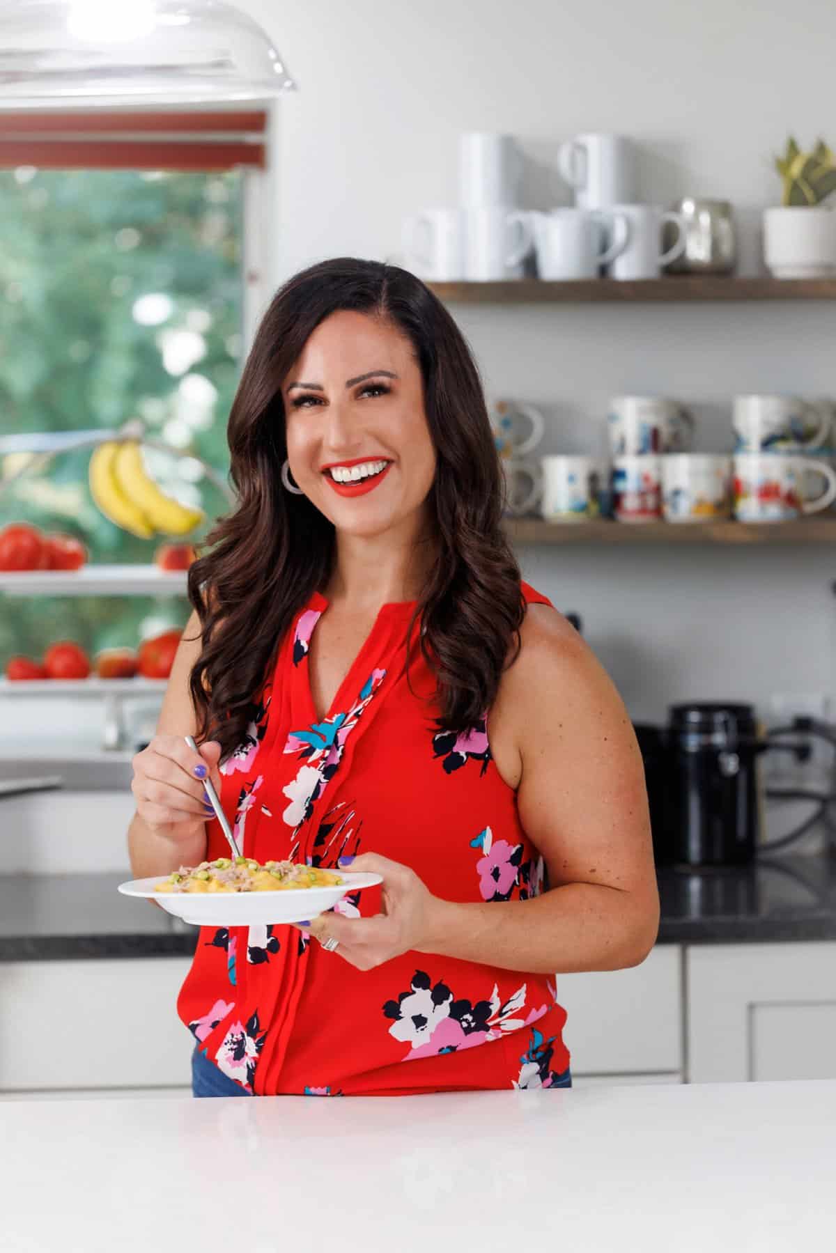 Liz enjoying stovetop mac and cheese with tuna and peas.