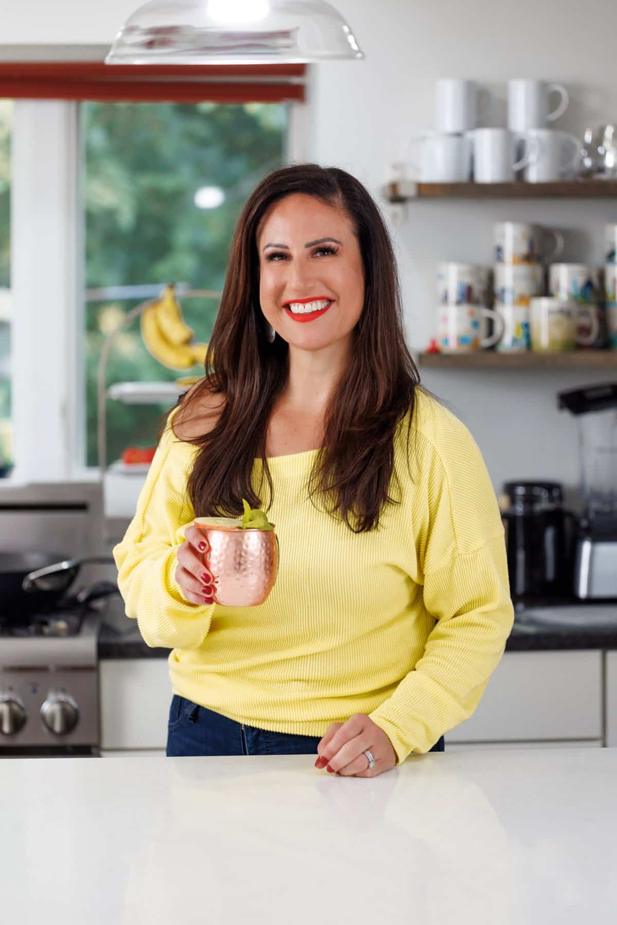 Liz enjoying an apple cider moscow mule.