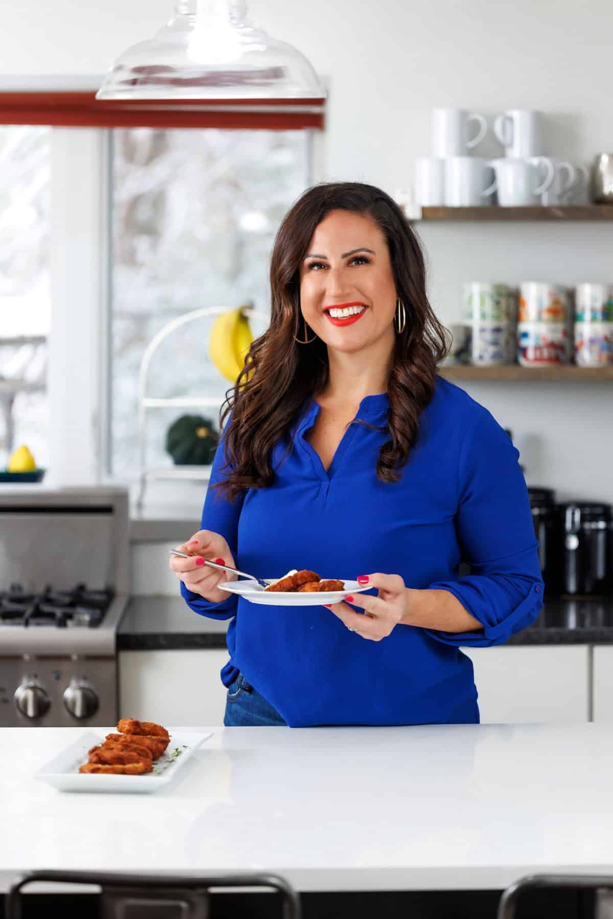 Liz enjoying traditional potato latkes.