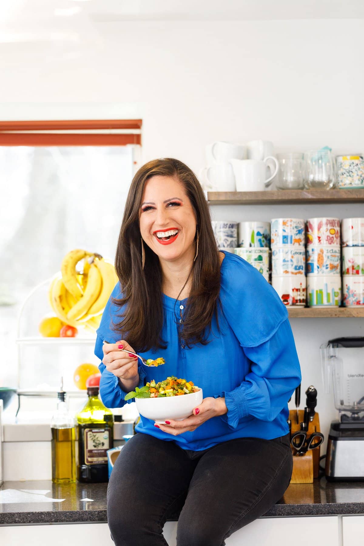 Liz eating a Lebanese chopped salad.