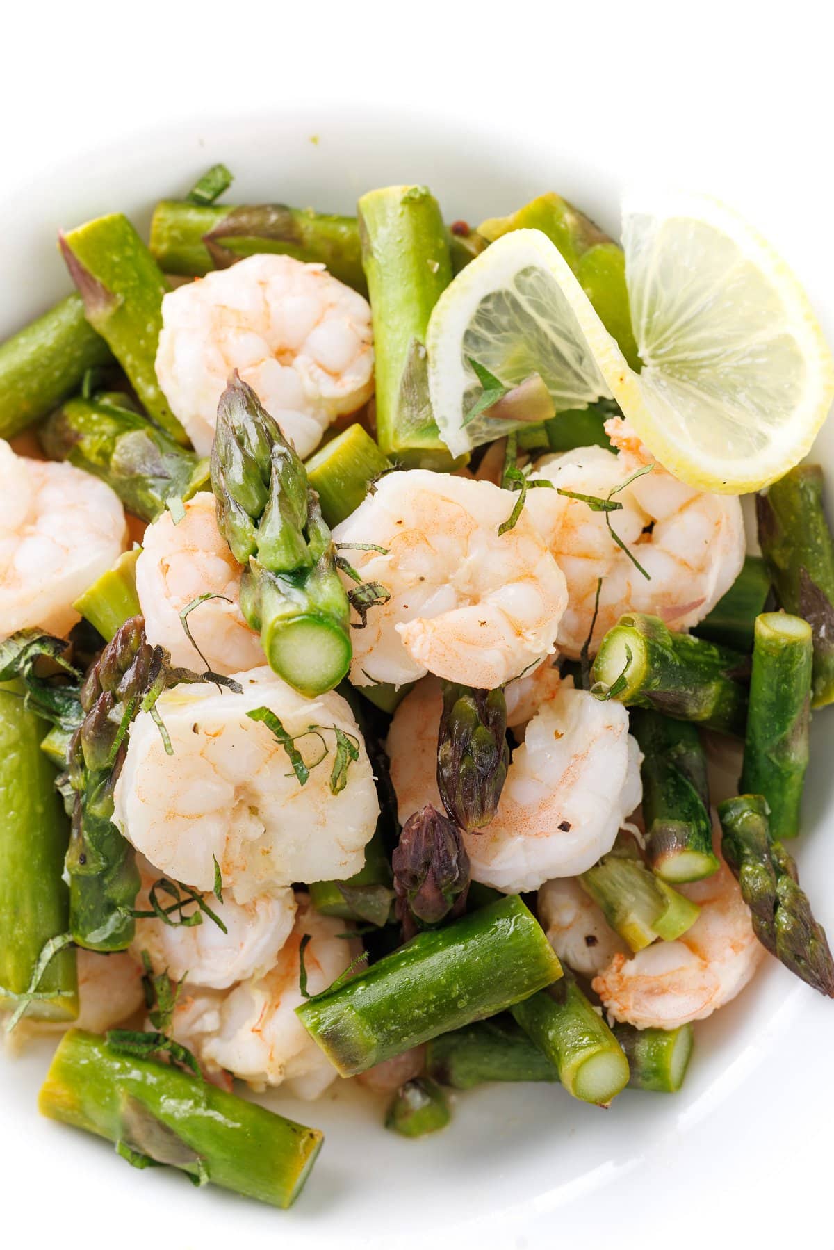 Shrimp and asparagus pouches with lemon garlic butter.