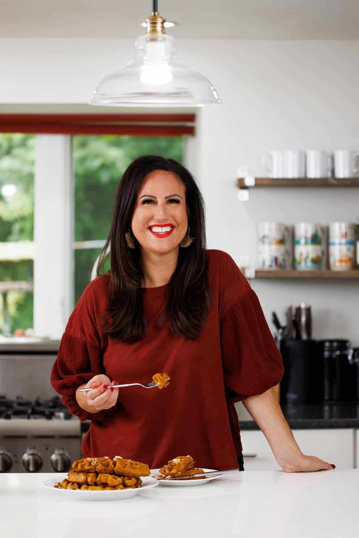 Liz eating healthy pumpkin waffles.