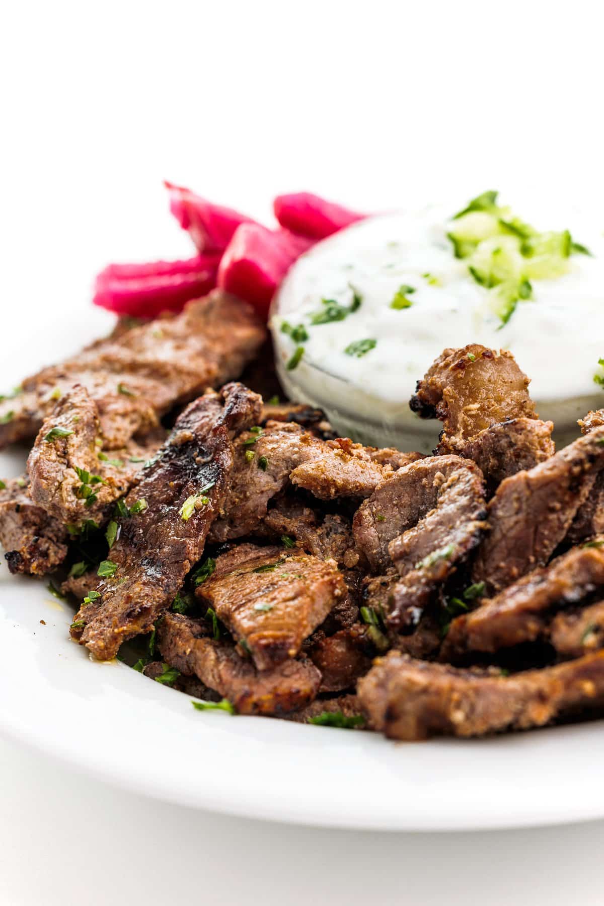 a plate of meat and vegetables