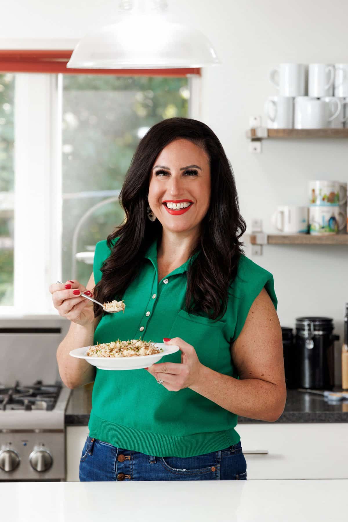 Liz eating Lebanese rice pilaf.