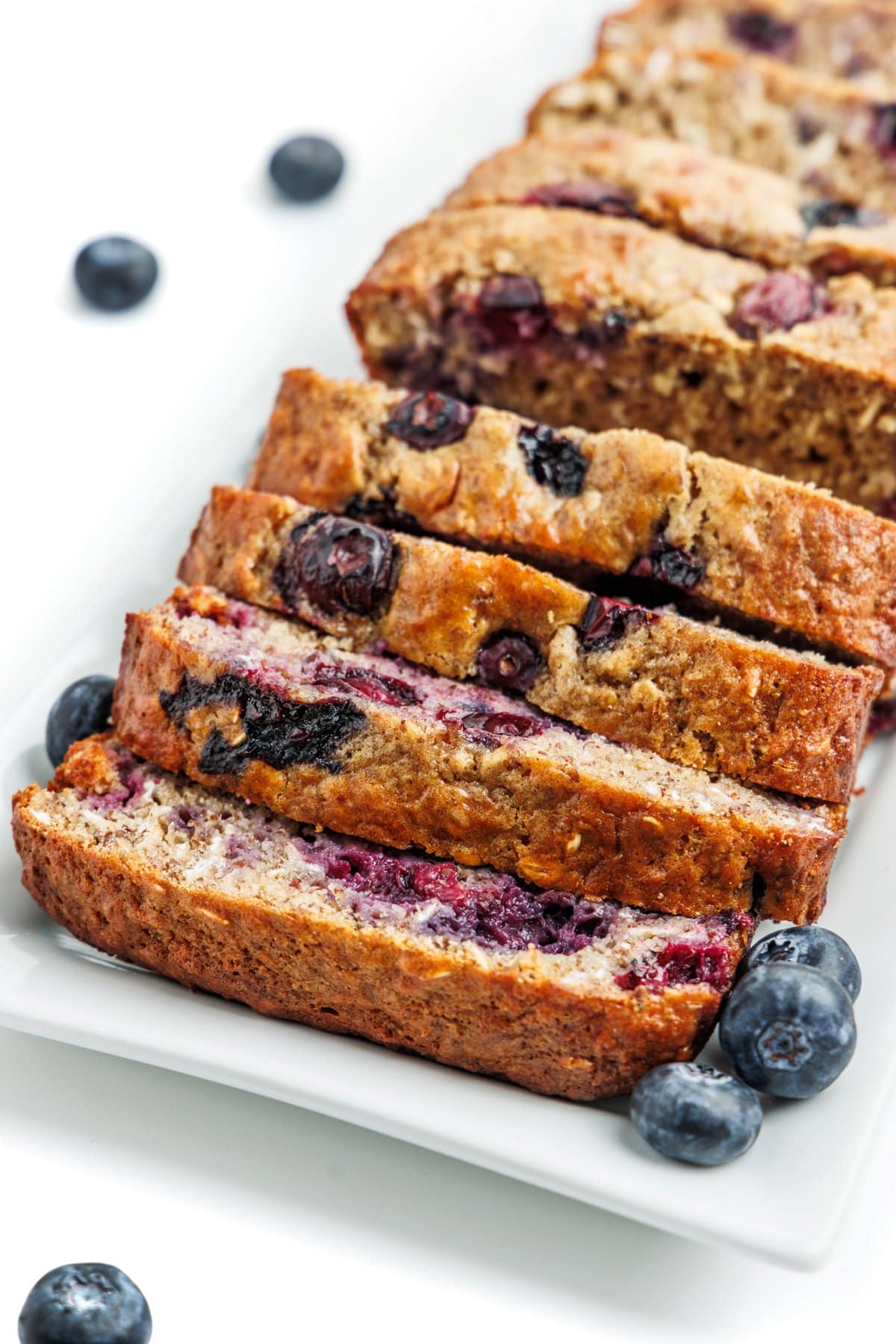 Blueberry yogurt bread sliced and ready to serve.