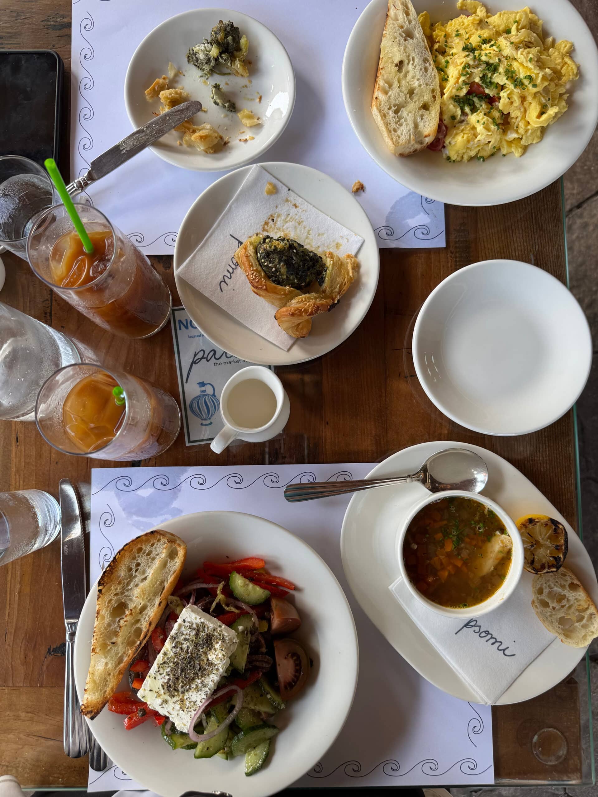 Breakfast food laid out on table at psomi.