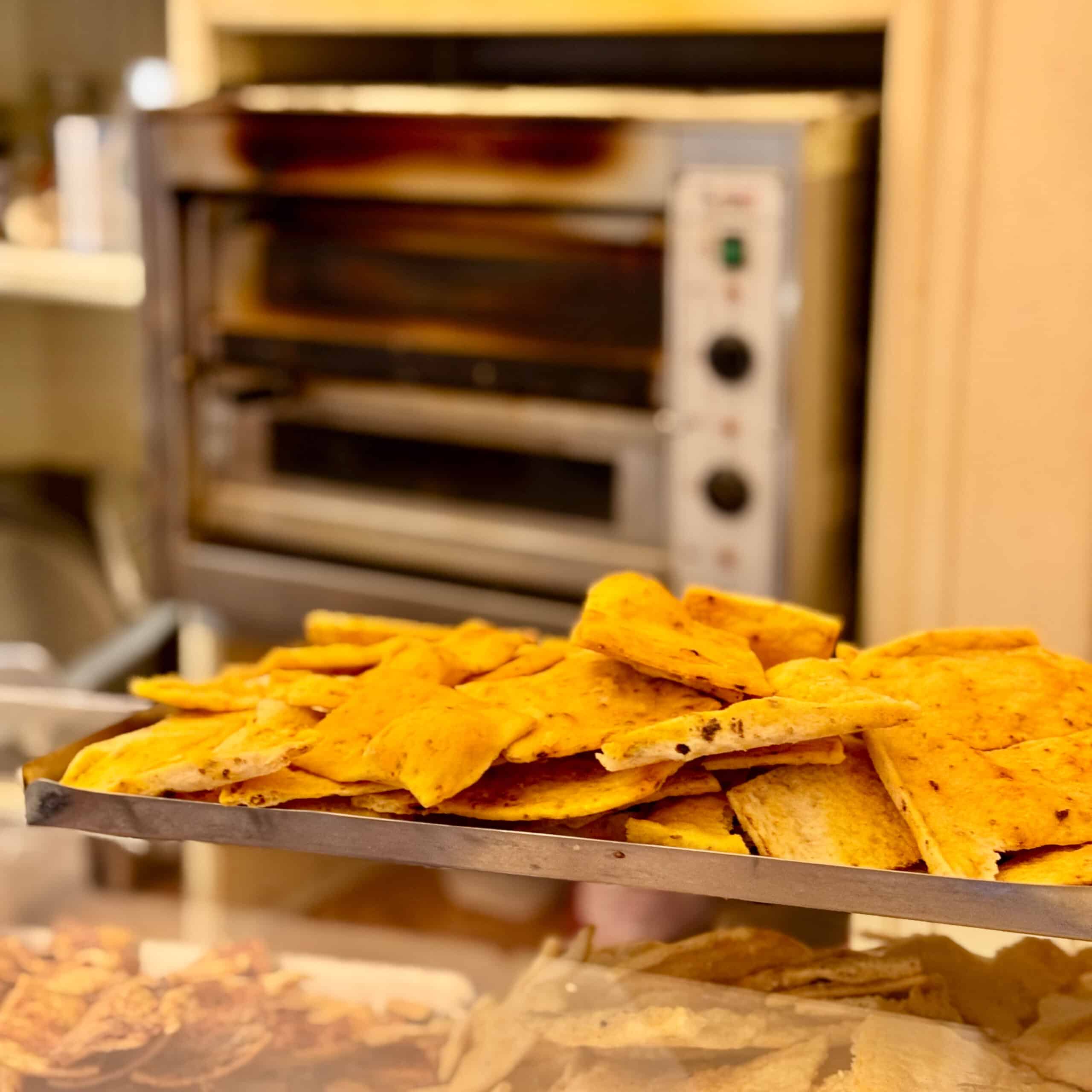 Turmeric and asiago crackers at Forno Pintucci bakery.